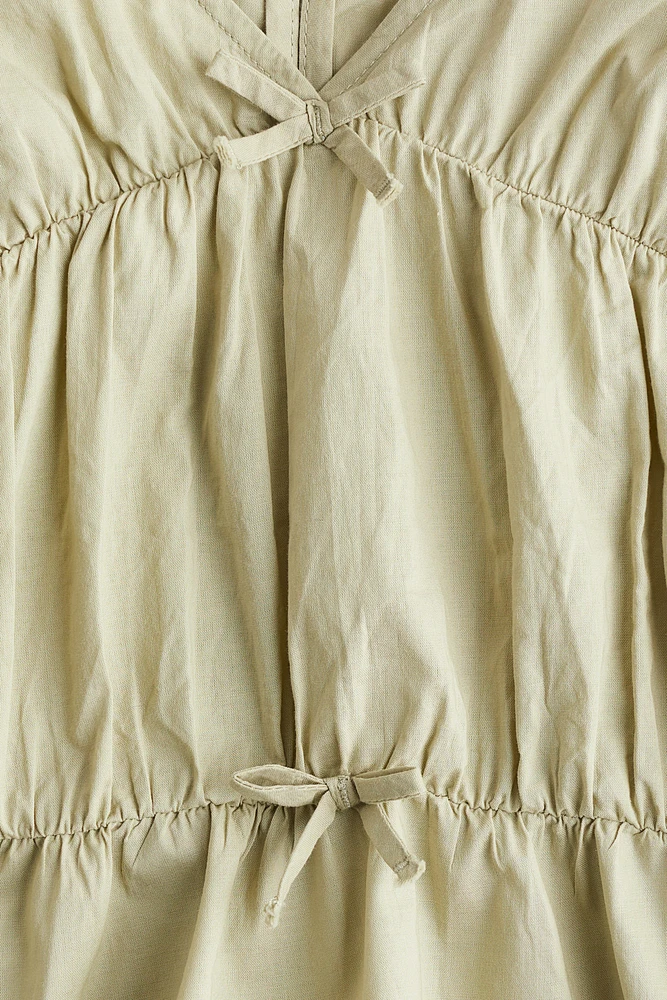Blouse péplum en coton