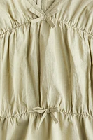Blouse péplum en coton