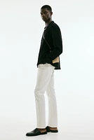 Pantalon aminci en tissu croisé de coton