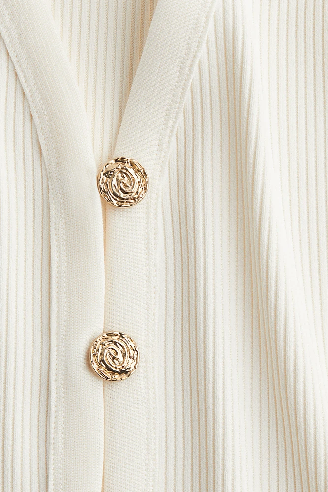 Gilet à boutons