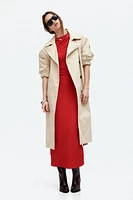 Robe moulante à effet drapé