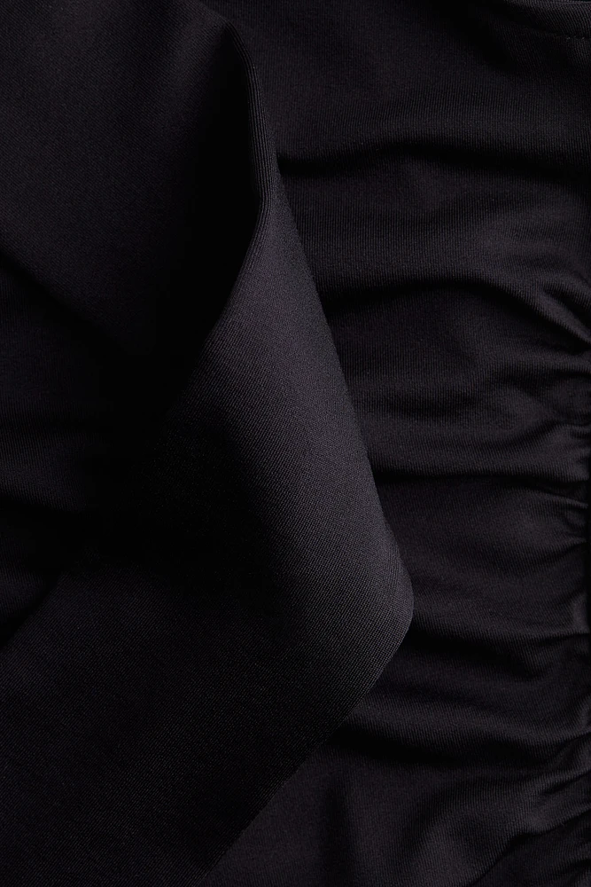 Haut asymétrique à effet drapé