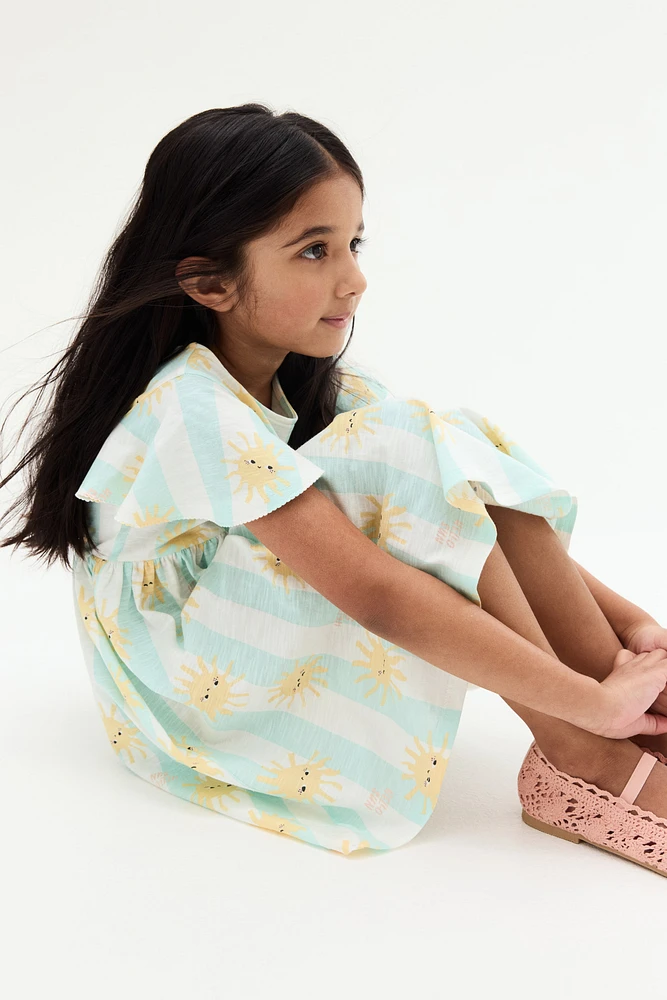 Robe à manches volants en coton