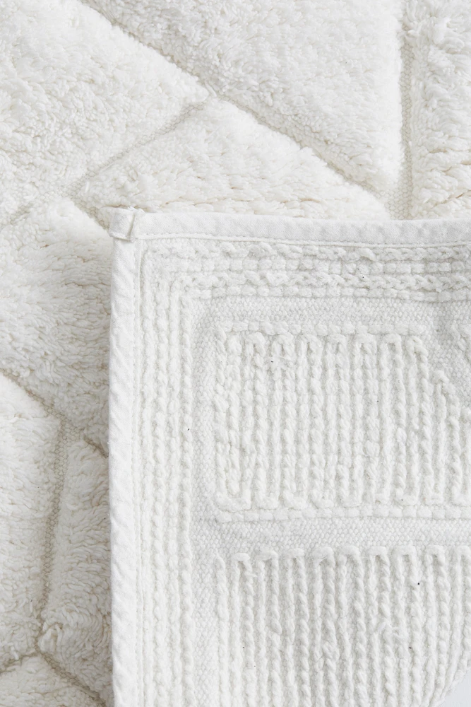 Tapis de bain en coton bouclé