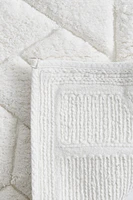 Tapis de bain en coton bouclé