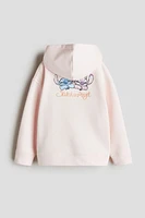Veste à capuche imprimée fermeture éclair
