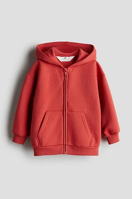 Veste à capuchon glissière