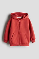 Veste à capuchon glissière