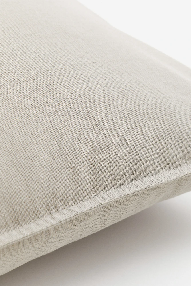 Housse de coussin en lin mélangé