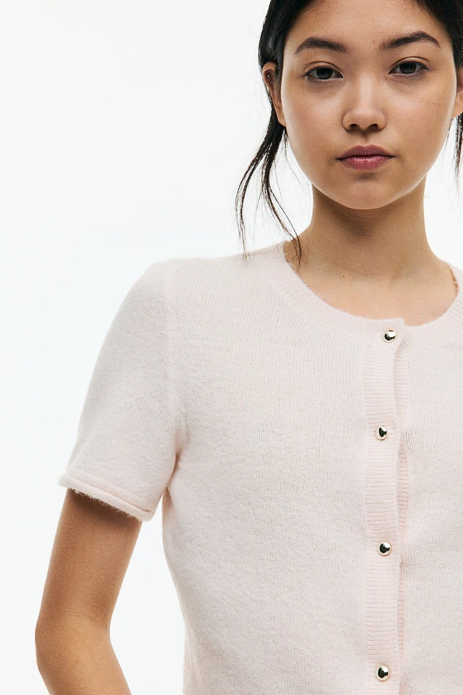 Gilet à manches courtes en fin tricot