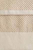 Serviette de bain en coton éponge