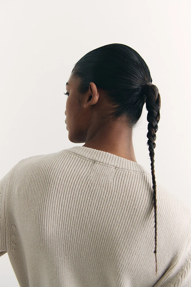Robe en tricot avec poches devant