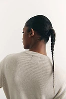 Robe en tricot avec poches devant