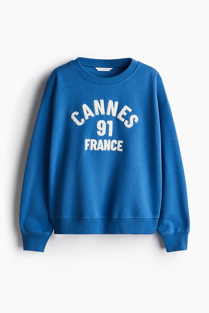 Sweatshirt with Text Motif