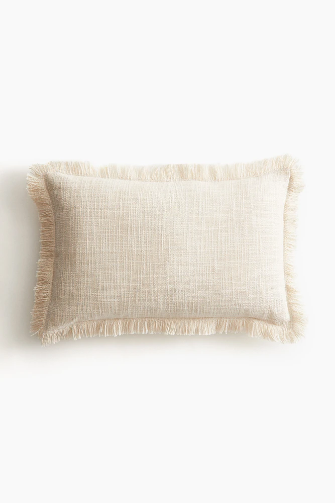 Housse de coussin en tissu flammé