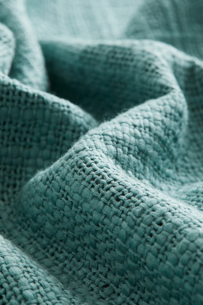Housse de coussin en tissu flammé