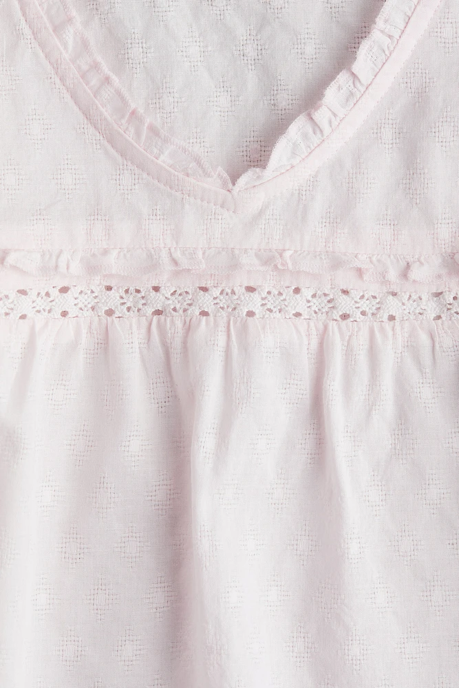 Blouse à volant en coton