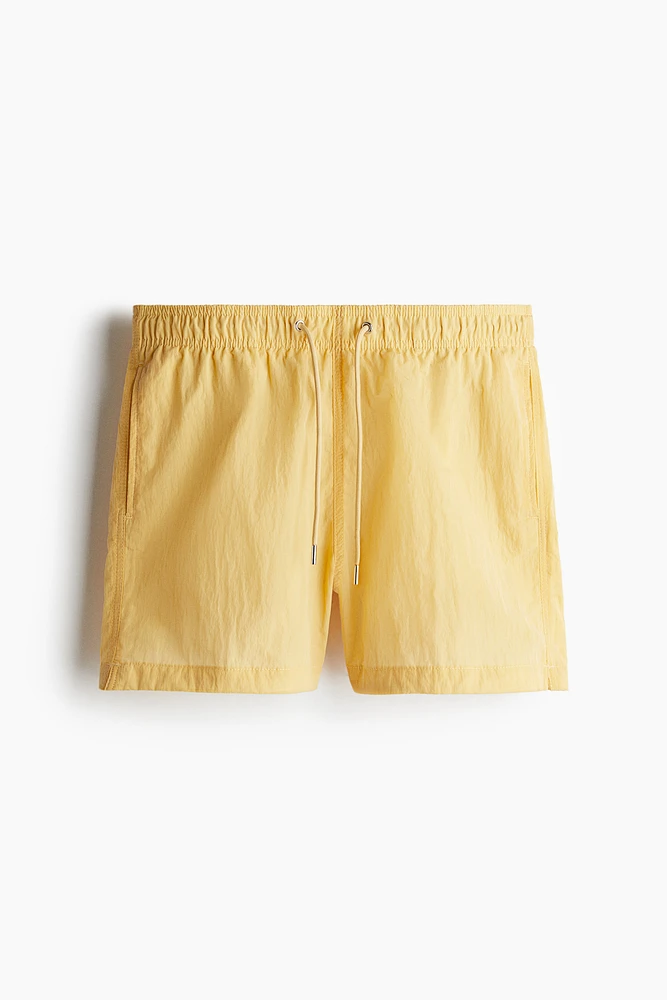 Short de bain froissé