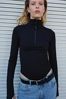 Half-Zip Rib-Knit Thong Bodysuit