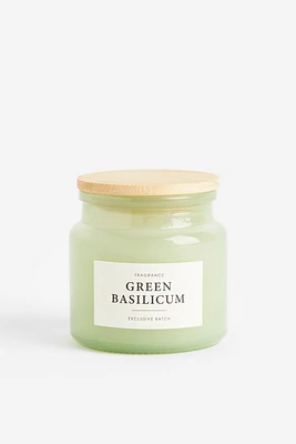 Bougie parfumée dans un pot en verre