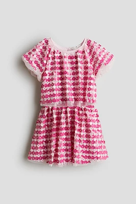 Ensemble 2 pièces à sequins avec haut et jupe