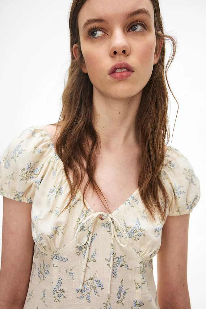 Robe maxi avec détail à nouer