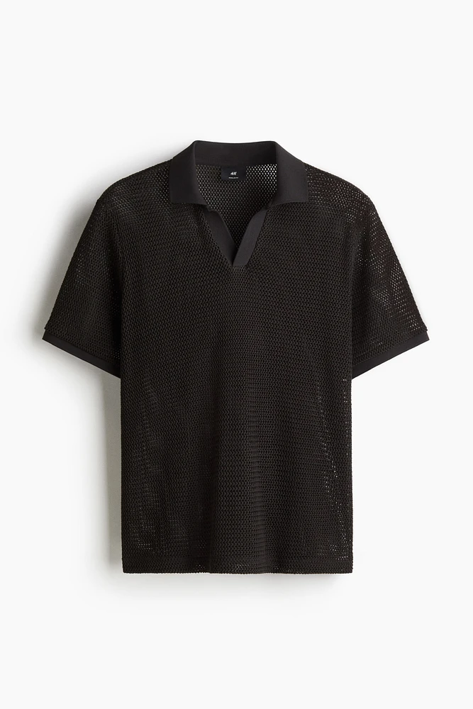 Polo classique en tricot ajouré