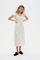 Robe maxi avec détail à nouer