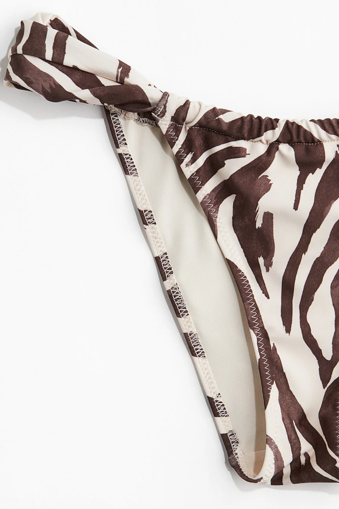 Bas de maillot Tanga échancré
