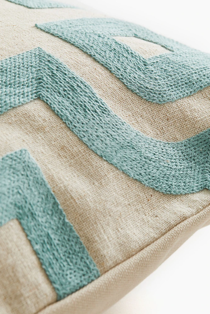 Housse de coussin à motif