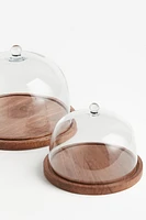 Cloche en verre avec plateau en bois