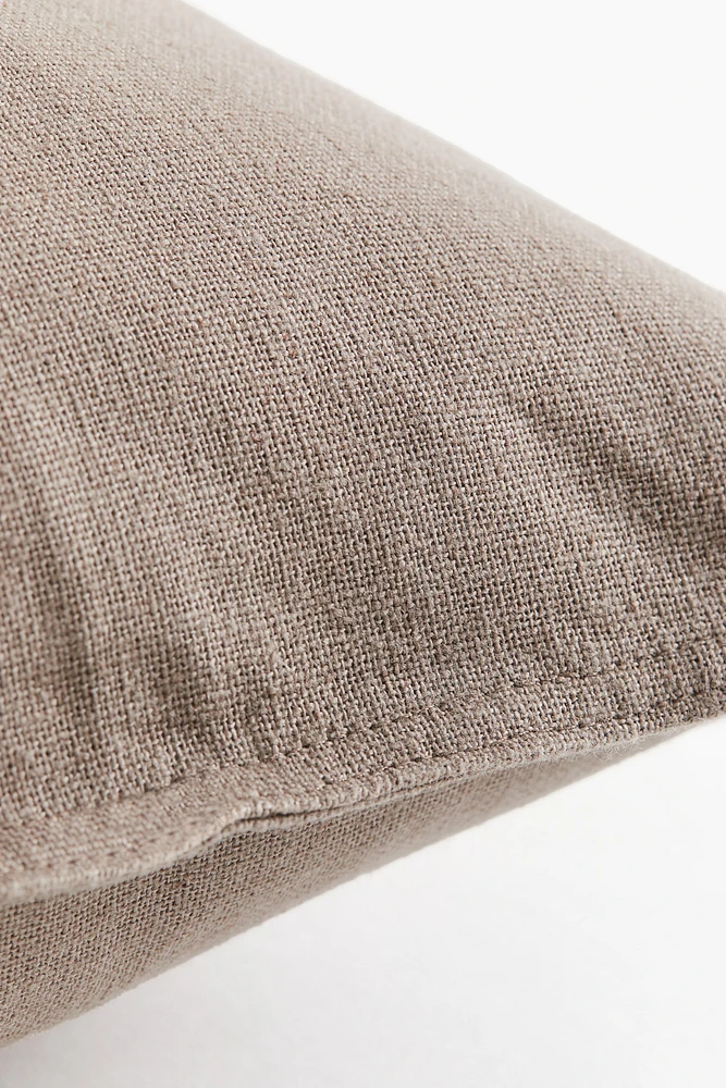 Housse de coussin en lin mélangé