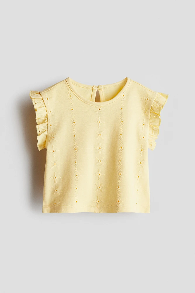 Haut avec broderie anglaise