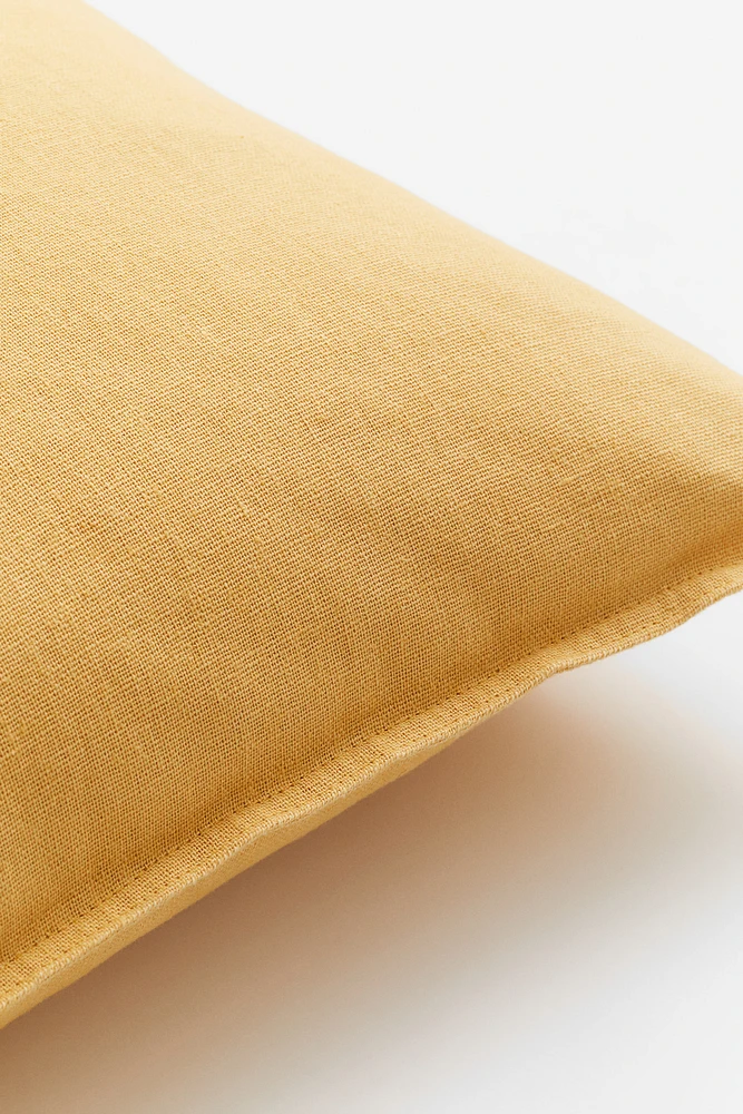 Housse de coussin en lin mélangé