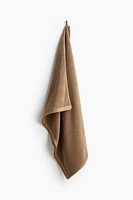 Drap de bain en éponge