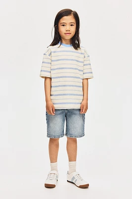 Short coupe ample en denim