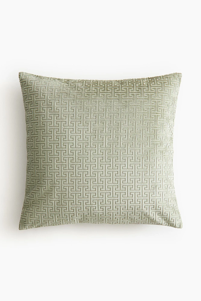 Housse de coussin à motif