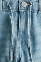 Jean à jambes larges