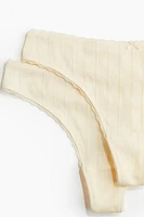 Lot de 2 culottes tanga en pointelle