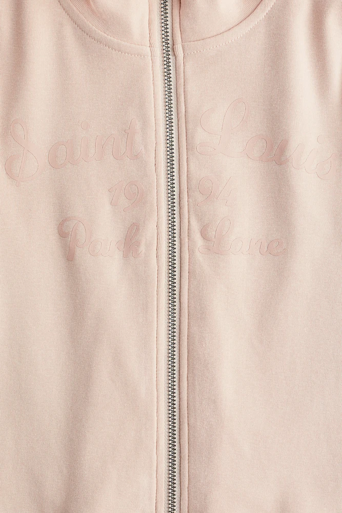 Veste à glissière avec motifs