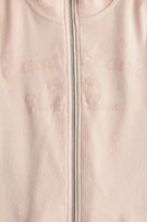 Veste à glissière avec motifs