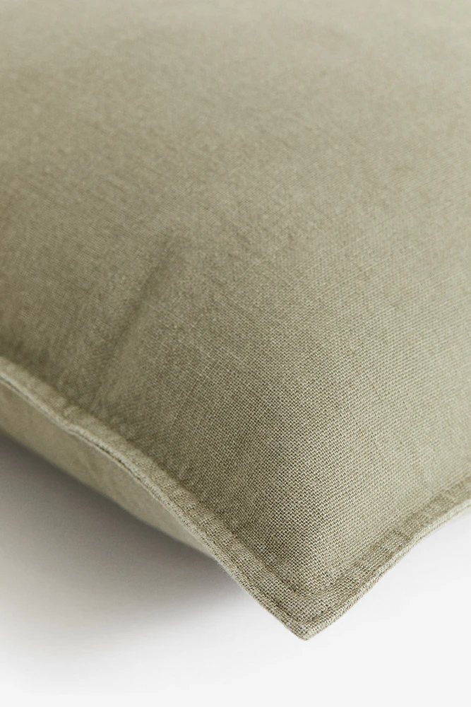Housse de coussin en lin mélangé