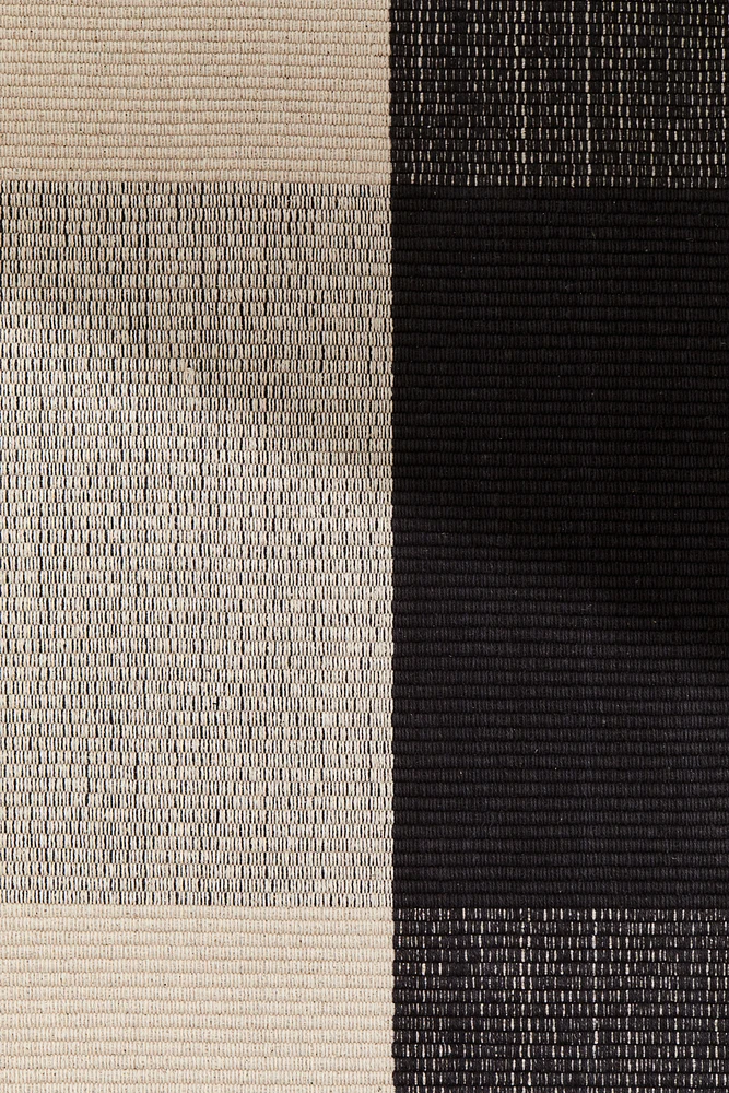 Tapis tissé à plat avec décor à carreaux