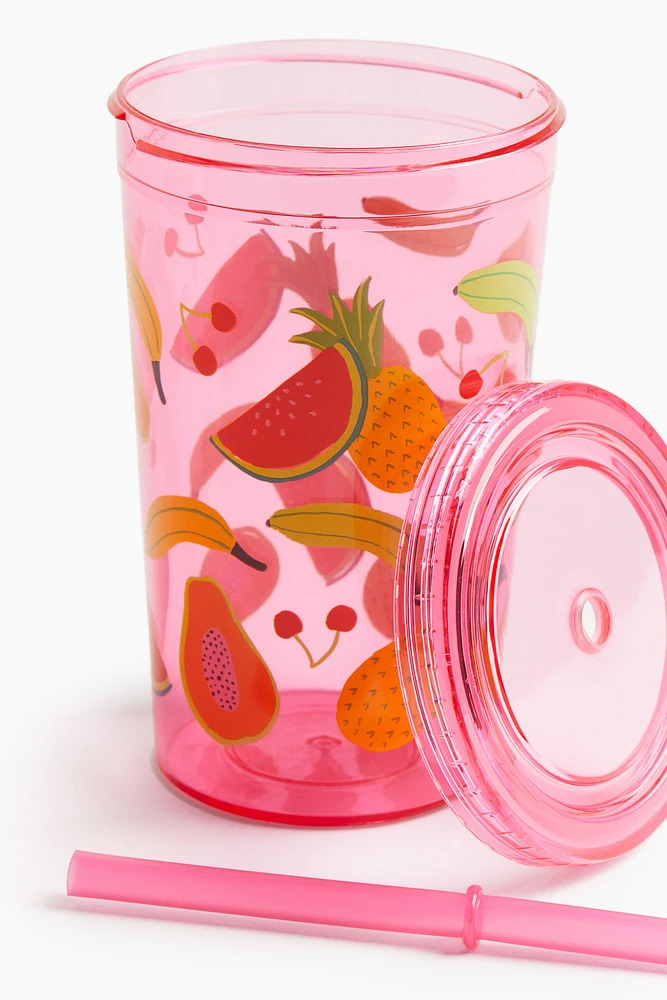 Gobelet en plastique à motif avec paille