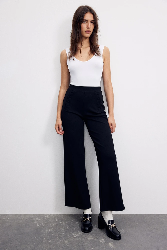 Pantalon à boutons