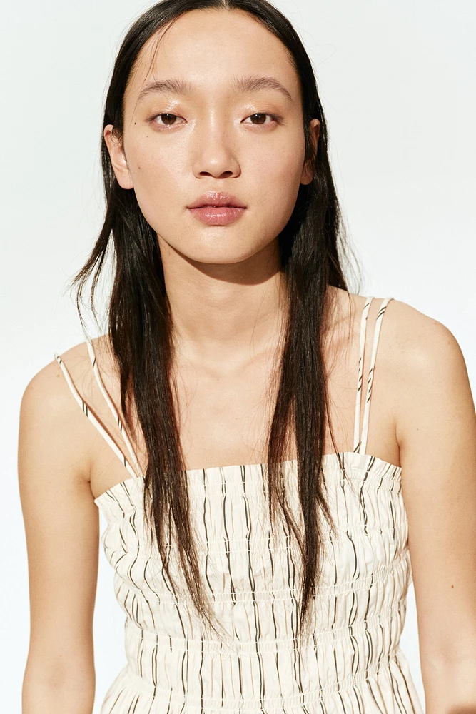 Robe en coton à corsage nid d'abeille