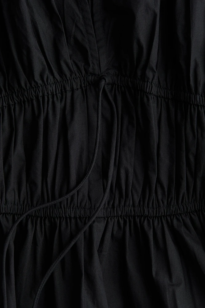 Blouse en popeline avec cordons de serrage