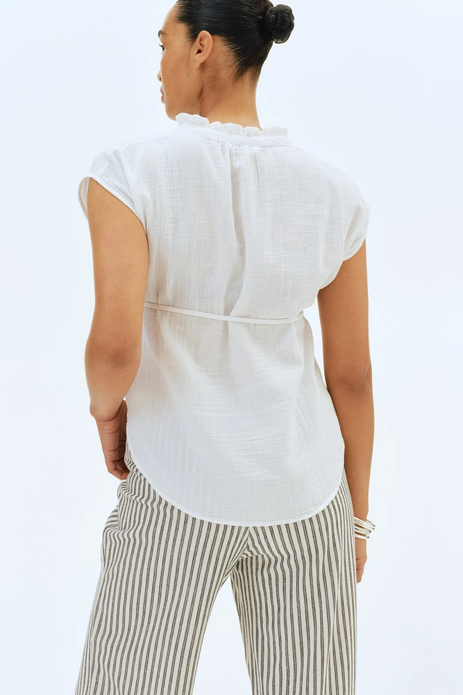Blouse MAMA en mousseline avec ceinture à nouer