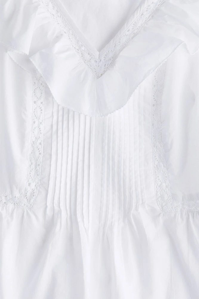 Ruffle-Trimmed Sleeveless Top