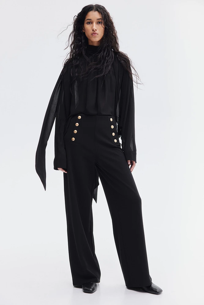 Pantalon à boutons